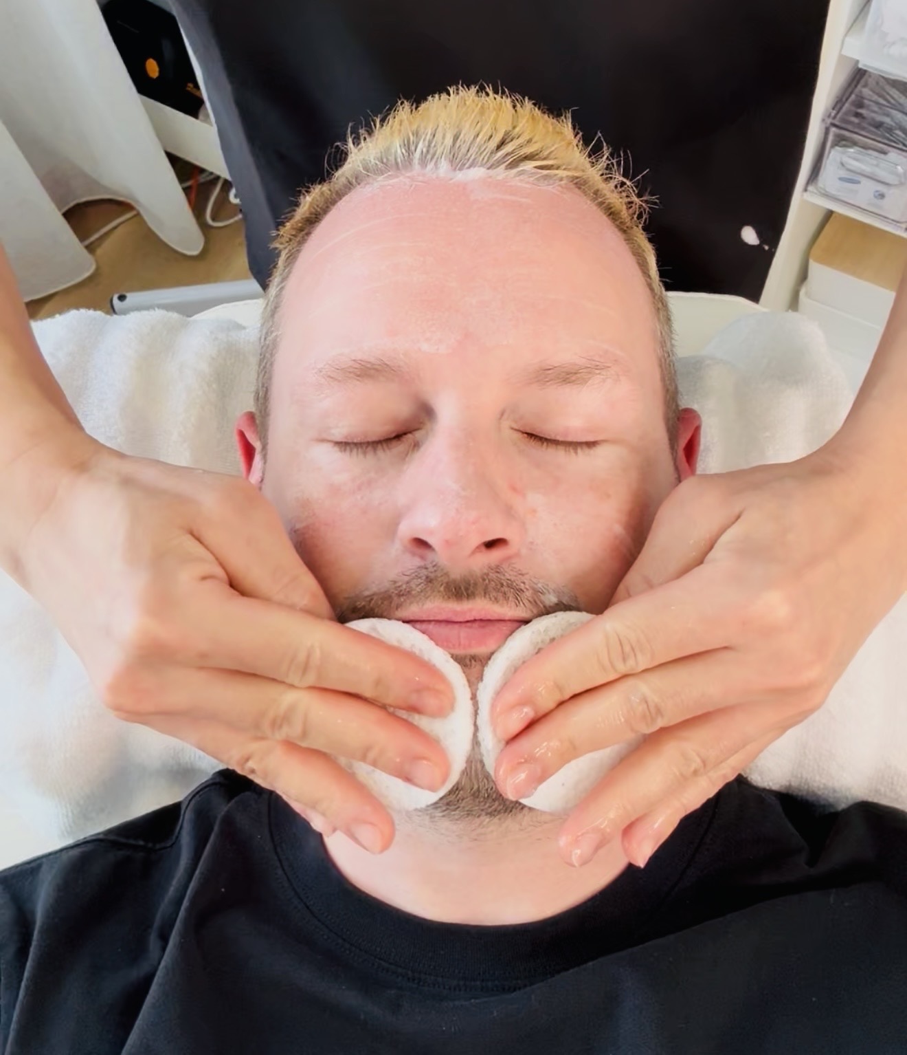 A client receiving a skin treatment at Vellia Aesthetics