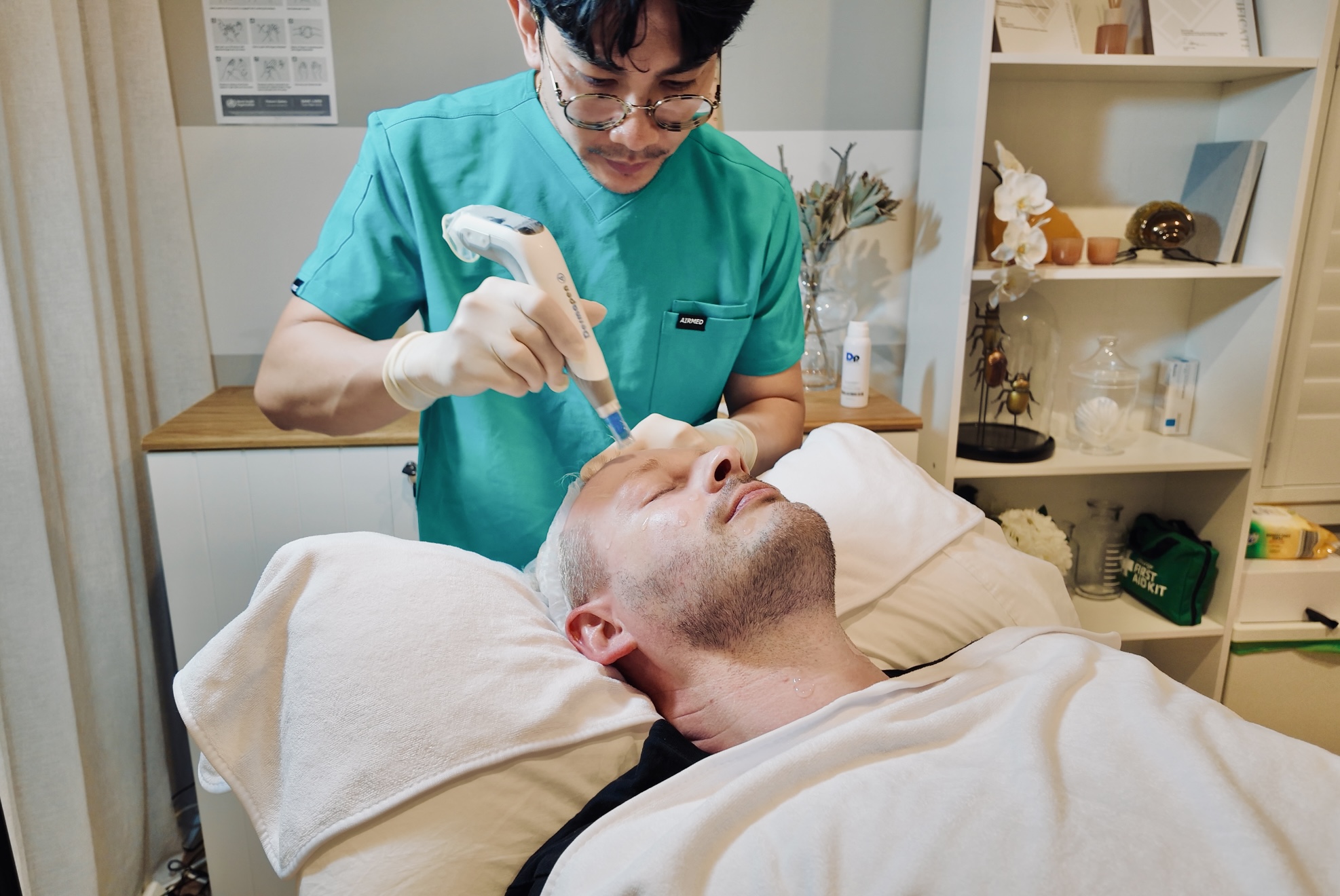 A detailed view of the microneedling process on facial skin