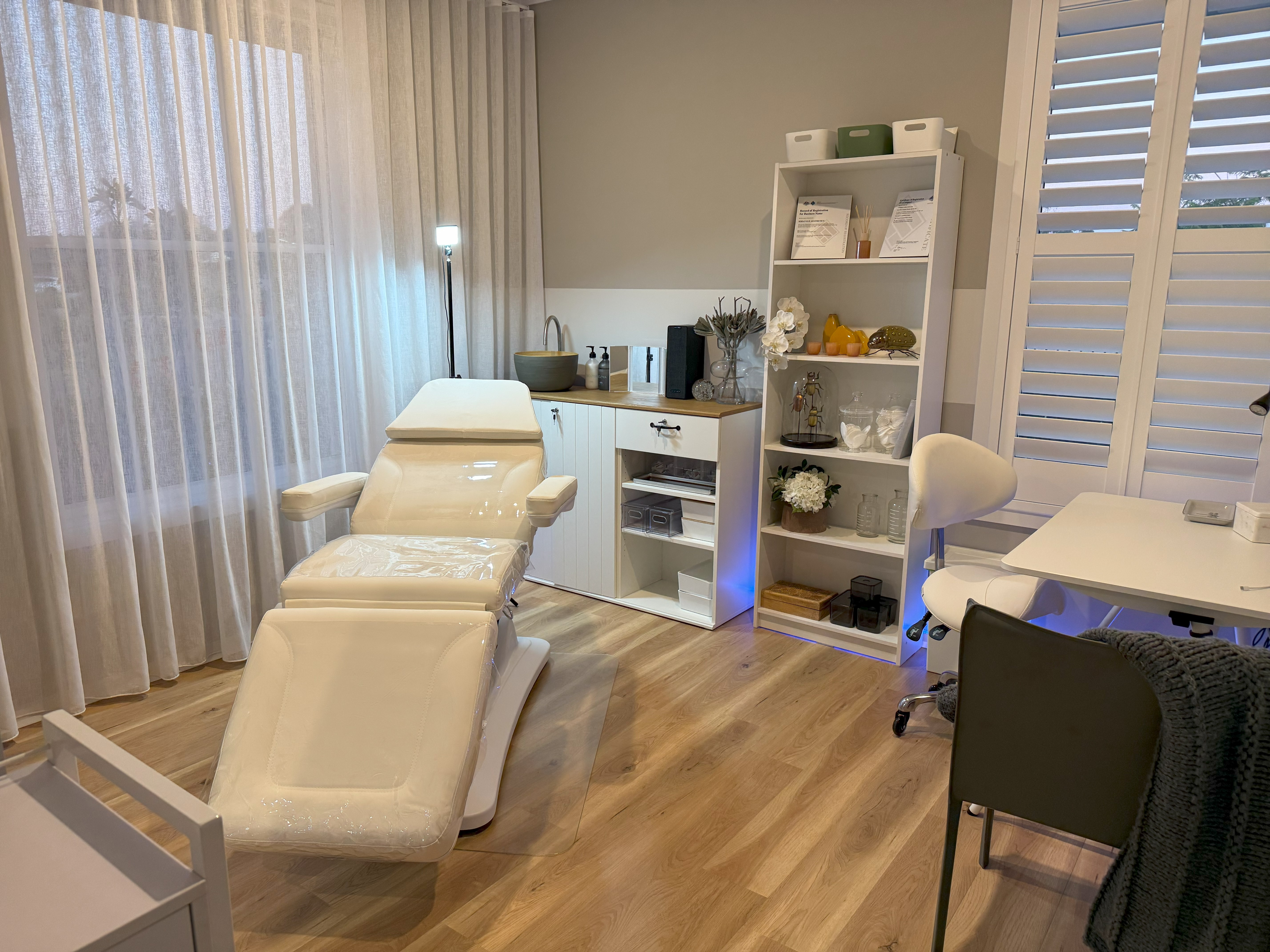 The clean and modern treatment room at Vellia Aesthetics